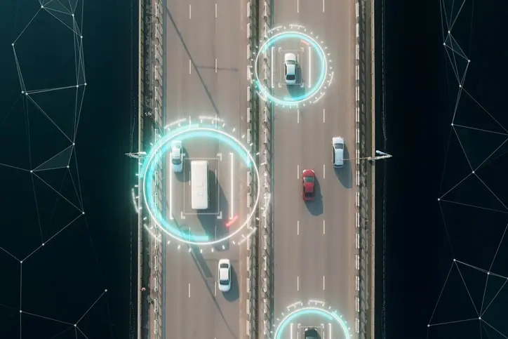 Cars on a bridge with tracking rings around them